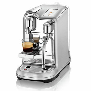 Machine à capsule, coloris gris argenté avec un expresso réalisé-Arlo's Coffee