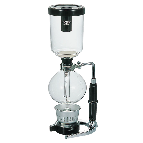 Cafetière siphon COULEUR : Noir TAILLE : H x L x P : 39 x 12 x 13 cm CAPACITÉ : 5 tasses POIDS (boîte incluse) : env. 1400g MATÉRIAUX: Cuve supérieure, Cuve inférieure, Brûleur à alcool, Verre résistant à la chaleur Garniture. Disponible chez Arlos' Coffee artisan torréfacteur à Rambouillet.