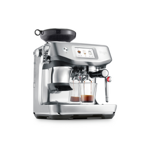 The Barista Touch Impress. Broyeur conique et écran interactif intégré. 1700 W. 30 réglages de moutures. Acier inoxydable. Trémie à grains 250g. Réservoir eau 2L. Buse vapeur pivotante. Pichet à lait inox 480ml. Système de dosage de précision The Razor. Pression 15 bars. Vue de coté. ARLO'S COFFEE artisan torréfacteur à Rambouillet (78)