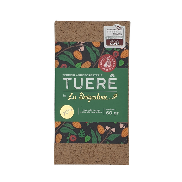 Découvrez la tablette Teruê 60gr avec 70% de cacao, médaille d'argent au concours du meilleur cacao d'Amérique du Sud. Arômes végétaux, terreux et boisés, Teruê ravira les férus de chocolat noir. Cacao issu de l'agroforesterie et une tablette issu du mouvement Bean to Bar.