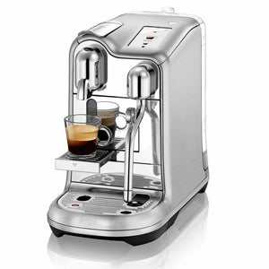 Machine à capsule, coloris gris argenté avec un expresso réalisé-Arlo's Coffee