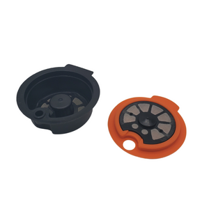 Capsule réutilisable compatible avec une machine Tassimo, en acier inoxydable et couvercle en silicone. En vente chez Arlo’s Coffee, artisan torréfacteur de café de spécialité situé à Rambouillet dans les Yvelines. Café en grain et moulu. Café éthique et responsable.  